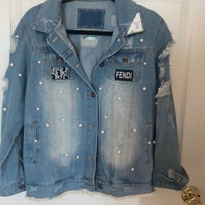 Ripped Denim jacket with logos and pearls